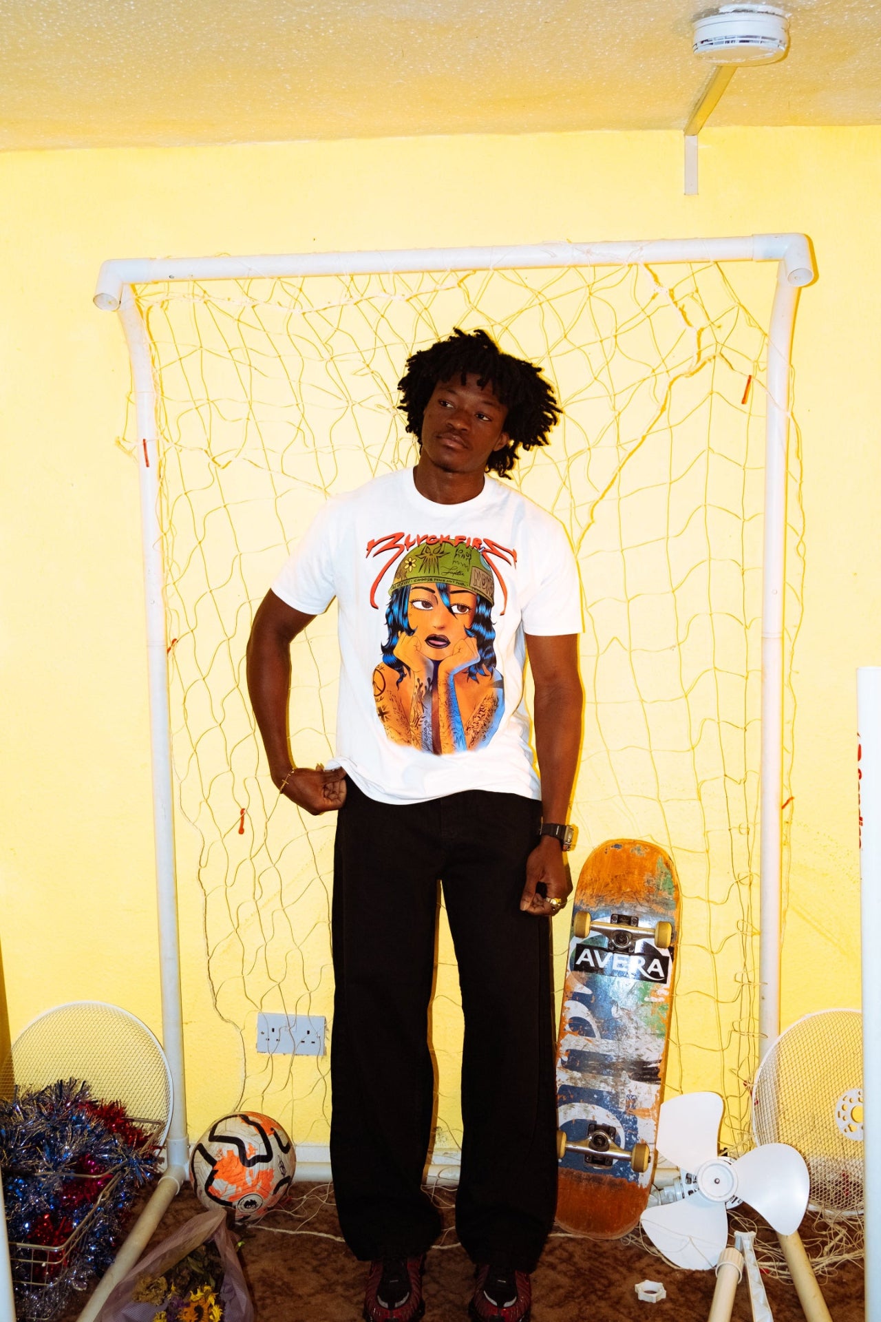 Model wearing blvckfire army girl tshirt