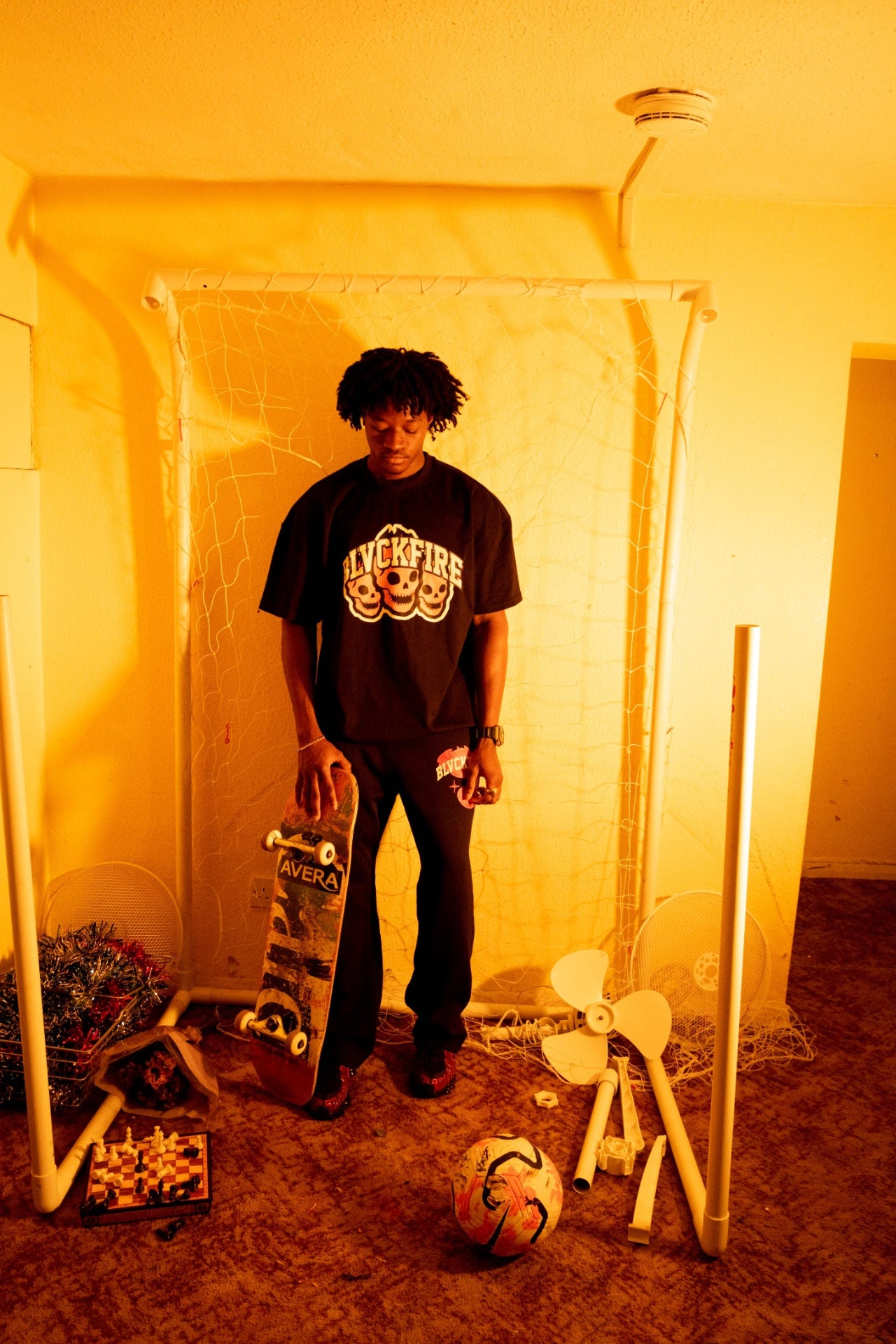 Model wearing blvckfire 3 skulls tshirt