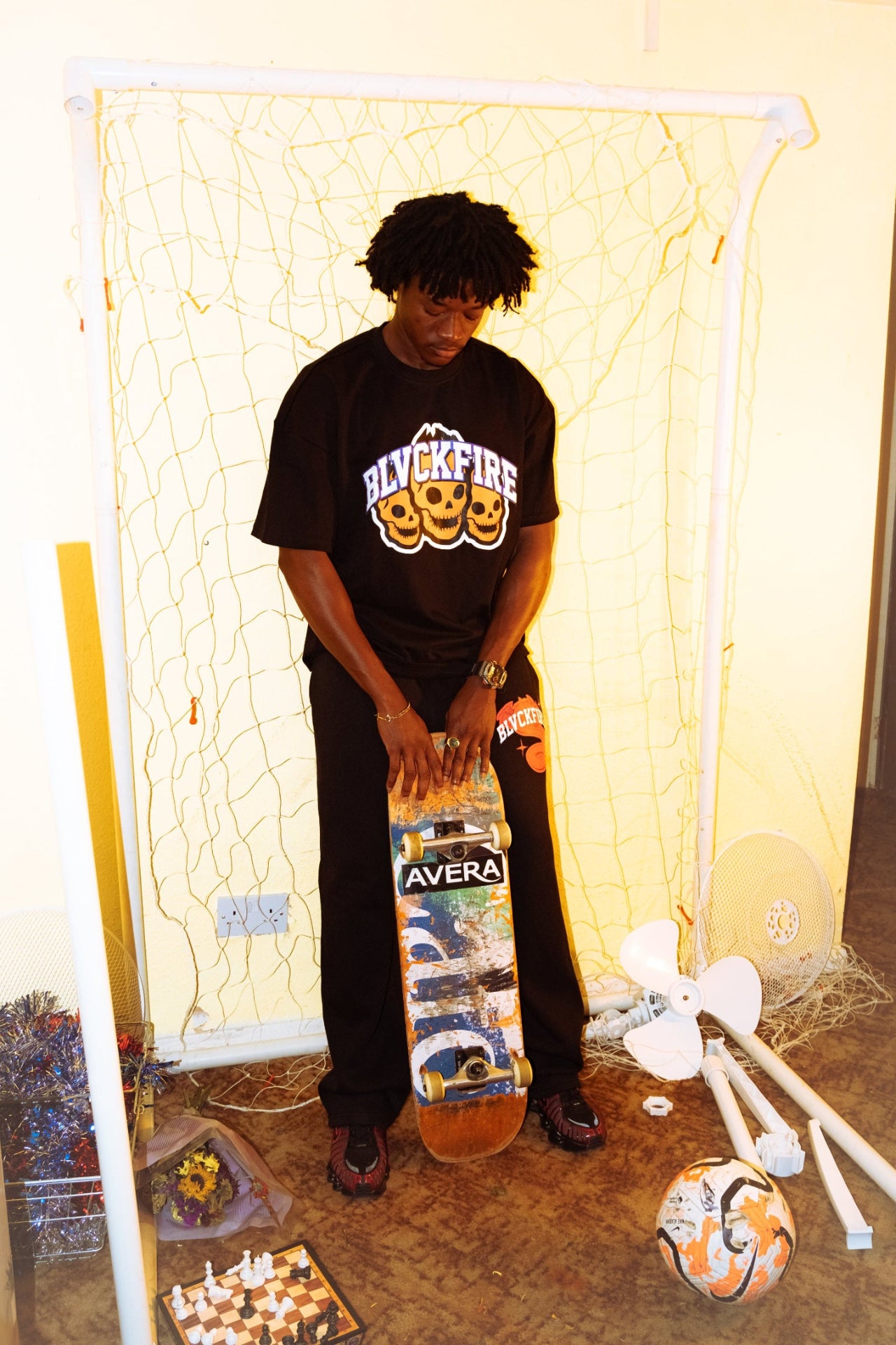 Model wearing blvckfire 3 skulls tshirt