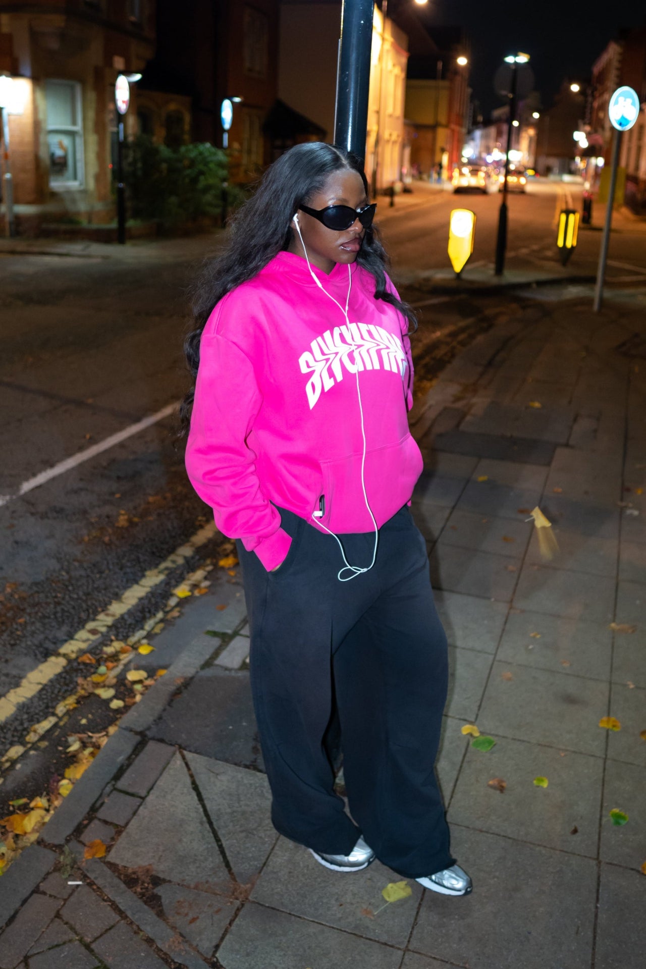 Model wearing pink blvckfire warped hoodie