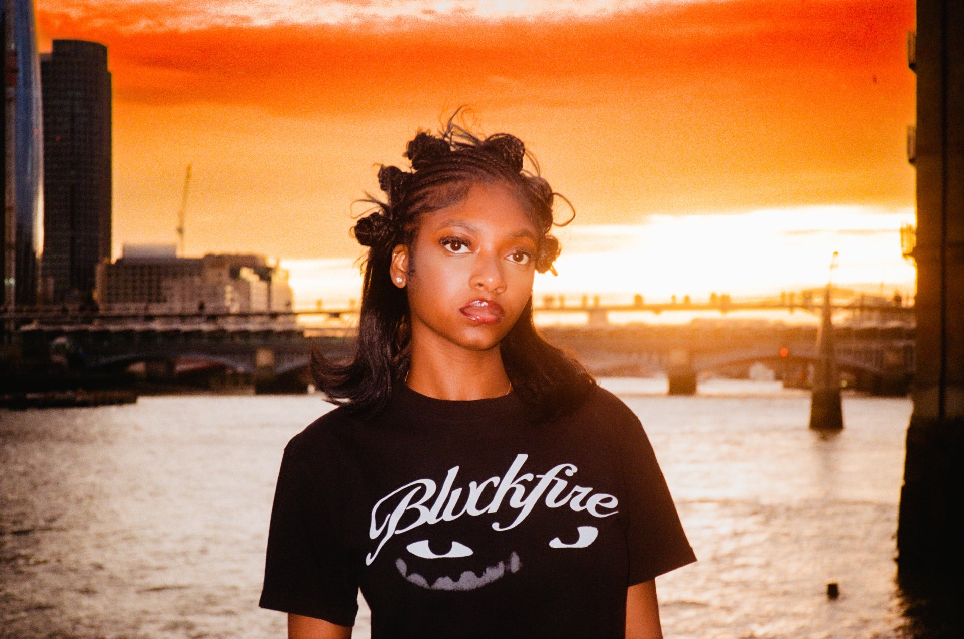Ona wearing Blvckfire Observer T-shirt